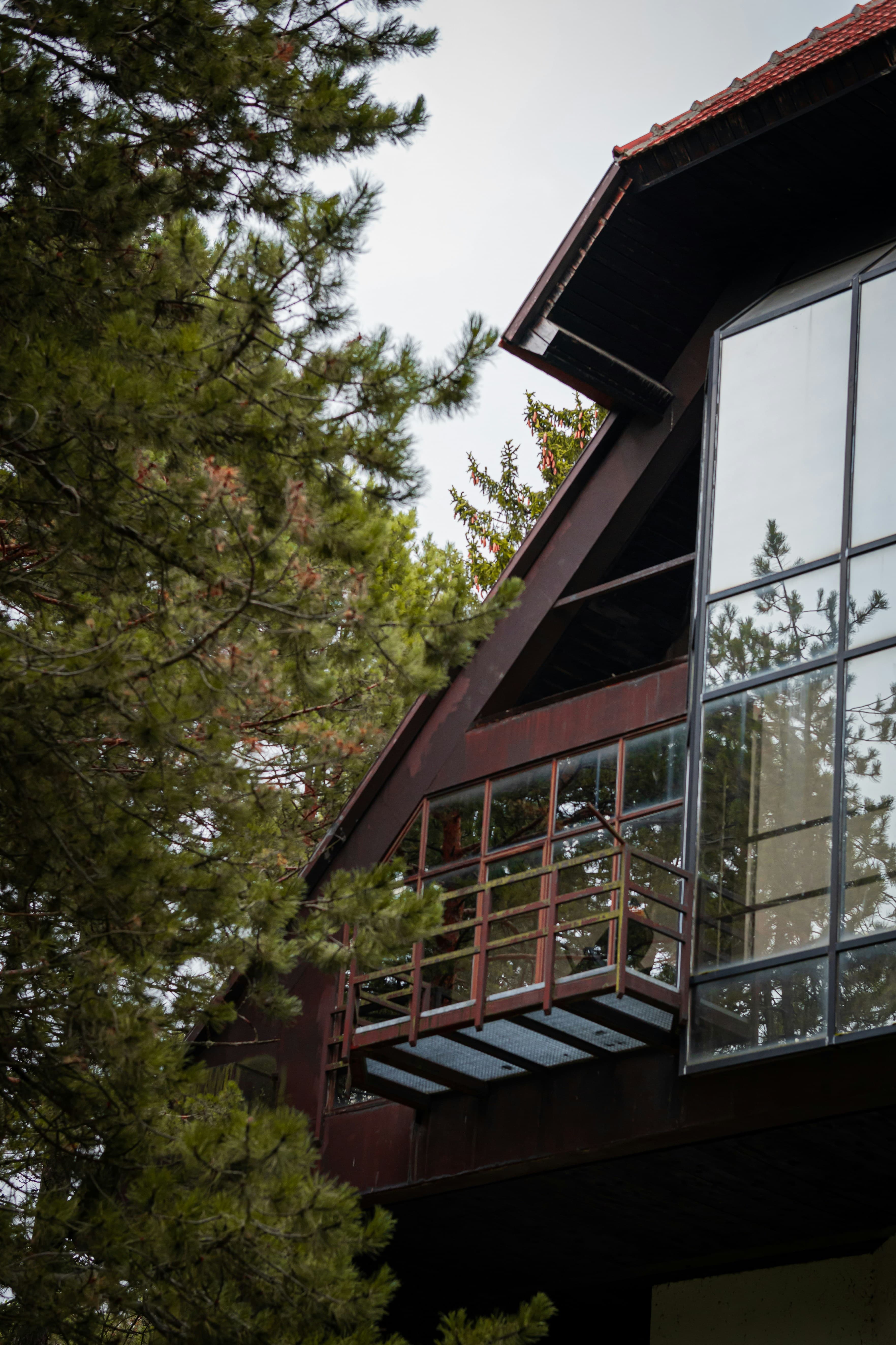 A 3D wireframe of a house with red padlocks.